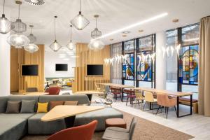 TV a/nebo společenská místnost v ubytování Hampton By Hilton Tallinn