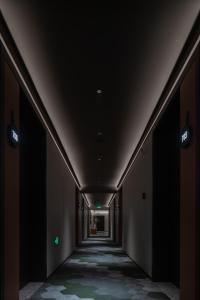 Mynd úr myndasafni af 欢桔酒店 郑州二七广场丹尼斯大卫城店 í Zhengzhou