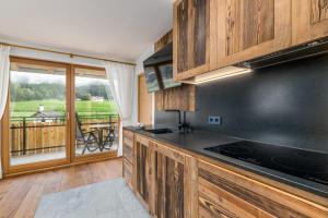 A kitchen or kitchenette at Ferienwohnung Mair am Bach
