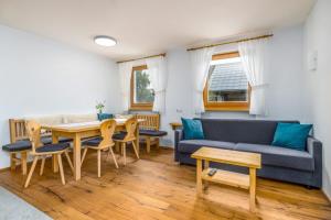 A seating area at Ferienwohnung Mair am Bach