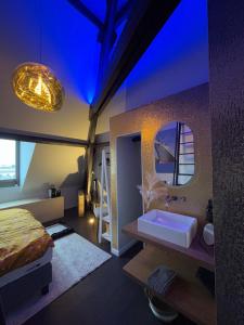 Postel nebo postele na pokoji v ubytování B&B Het Havenhuis