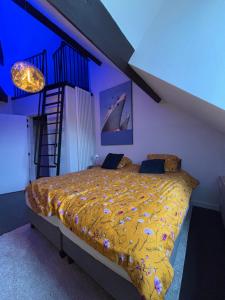 Postel nebo postele na pokoji v ubytování B&B Het Havenhuis