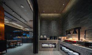 Eldhús eða eldhúskrókur á 欢桔酒店 郑州二七广场丹尼斯大卫城店
