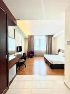 Postel nebo postele na pokoji v ubytování Seemsoon Hotel