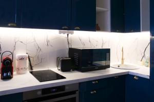 Photo de la galerie de l'établissement LUMINEUX Studio de 29m avec WIFI proche de PARIS, à Issy-les-Moulineaux