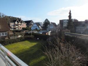 a view from the balcony of a town with houses at Appartementhaus Hüning --- adults only - no smoking in Grömitz
