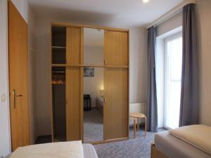 Postel nebo postele na pokoji v ubytování Appartementhaus Hüning --- adults only - no smoking