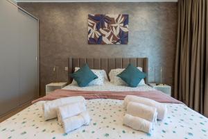 Giường trong phòng chung tại Le Ville Negli Ulivi +156 ảnh
