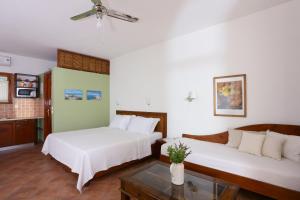 A bed or beds in a room at 9 Muses - Paros