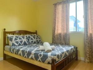 Katil atau katil-katil dalam bilik di Cebrian Apartment Rental Unit 1