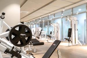a gym with a lot of treadmills and machines at Namsan Dream City in Seoul