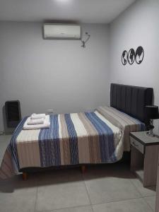 Hotel El Paraiso Boutique客房内的一张或多张床位