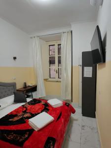 TV a/nebo společenská místnost v ubytování RATTAZZI ROMA CENTRo