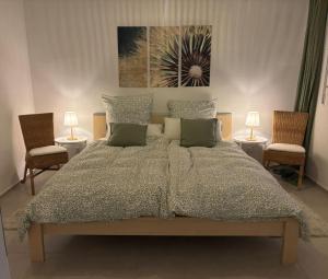 Ένα ή περισσότερα κρεβάτια σε δωμάτιο στο Ferienhaus "Boomen"