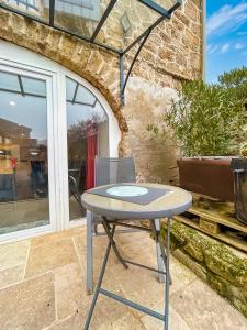 Balcon ou terrasse dans l'établissement Authentique séjour de charme Parc Naturel Du Pilat