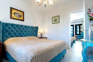 Postel nebo postele na pokoji v ubytování Assa Maris Beach Hotel