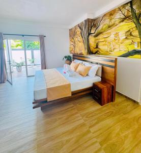 Ένα ή περισσότερα κρεβάτια σε δωμάτιο στο Sinha VIlla