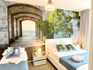 Katil atau katil-katil dalam bilik di Tahiti Suite Frontemare - Jesolo - SOLO FAMIGLIE +60 gambar