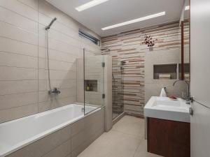 Koupelna v ubytování VILLA NIBA