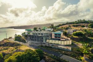an aerial view of a town next to the ocean at Horizon Lodge in Diamond Island