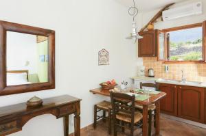 A kitchen or kitchenette at 9 Muses - Paros