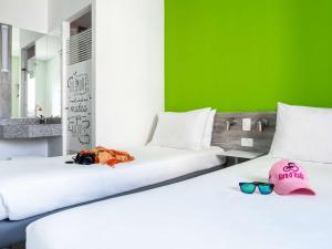 Postel nebo postele na pokoji v ubytování ibis budget Barranquilla