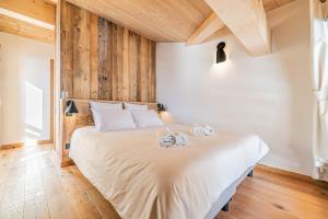 Posteľ alebo postele v izbe v ubytovaní Duplex Pen Men - LES GETS, proche du centre, jacuzzi, superbe vue