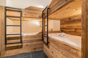 Posteľ alebo postele v izbe v ubytovaní Duplex Pen Men - LES GETS, proche du centre, jacuzzi, superbe vue