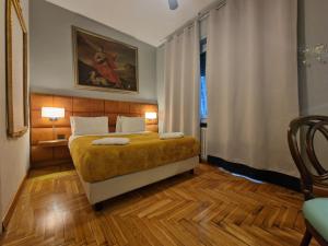 Posteľ alebo postele v izbe v ubytovaní Sweet Home Parioli