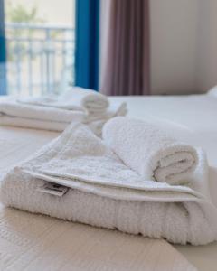 Postel nebo postele na pokoji v ubytování Hotel Nathalie