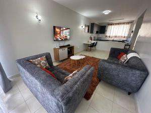 Posezení v ubytování Ecostay condo