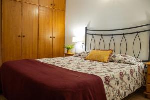 En eller flere senge i et værelse på Vivienda Vacacional Luna El Paso