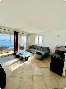 Posezení v ubytování Appartement F3(70m²) vue sur la mer
