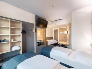 B&B HOTEL St-Pölten客房内的一张或多张床位
