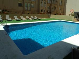 Bazén v ubytování AC Hotel La Línea by Marriott nebo v jeho okolí + 37 fotografií
