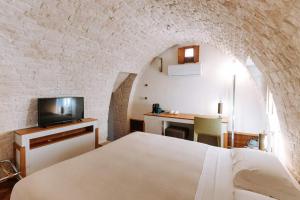 Postel nebo postele na pokoji v ubytování Santa Rosa Relais