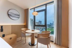 Χώρος καθιστικού στο Hangzhou Tonglu Fuchun River Blossom Hill Hotel