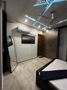 Postel nebo postele na pokoji v ubytování Cineplex Lodges Executive 2