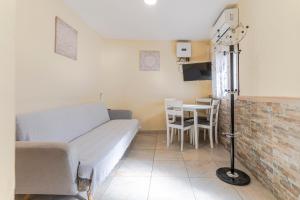 Televízia a/alebo spoločenská miestnosť v ubytovaní La Casita de la Plaza