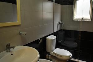 Koupelna v ubytování Elite Hotel