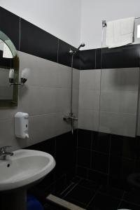 Koupelna v ubytování Elite Hotel