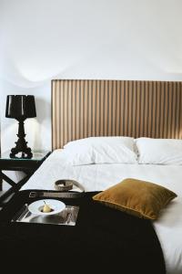 Letto o letti in una camera di Palazzo del Corso – Boutique Hotel