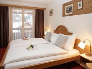 Postel nebo postele na pokoji v ubytování Apartment Chalet Abendrot apARTments-30 by Interhome
