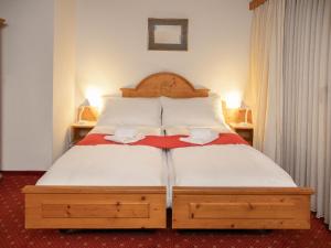 Postel nebo postele na pokoji v ubytování Apartment Chalet Abendrot apARTments-8 by Interhome