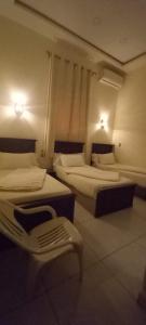 Voodi või voodid majutusasutuse Five Hostel toas