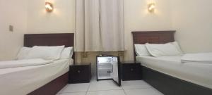 Voodi või voodid majutusasutuse Five Hostel toas