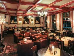 Posezení v ubytování Hotel Cafe Restaurant Duinzicht