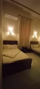 Voodi või voodid majutusasutuse Five Hostel toas