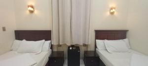 Voodi või voodid majutusasutuse Five Hostel toas