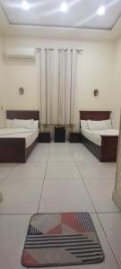 Voodi või voodid majutusasutuse Five Hostel toas